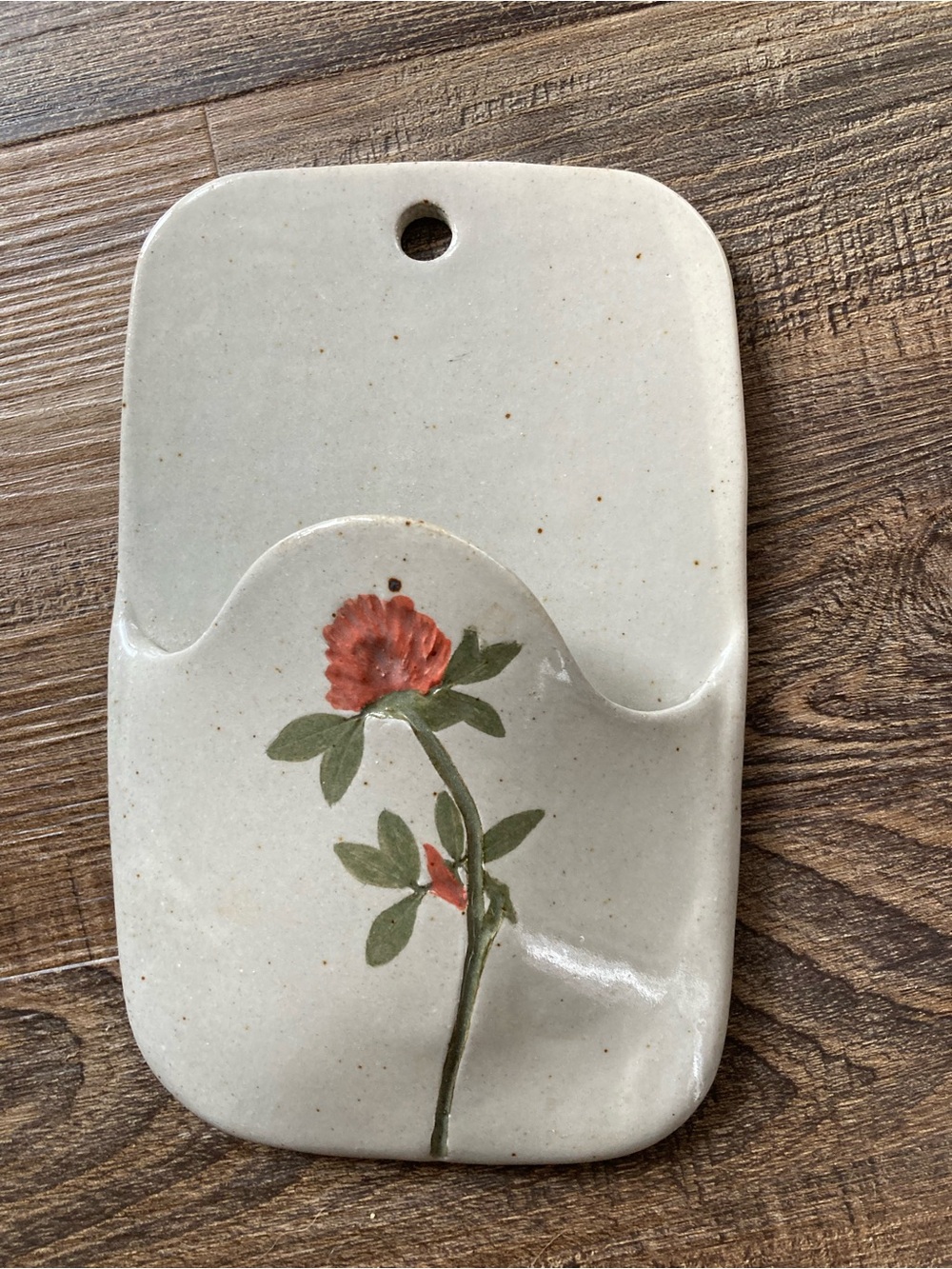 Stetson Cream Ceramic Wall Pocket with Red Floral Accent